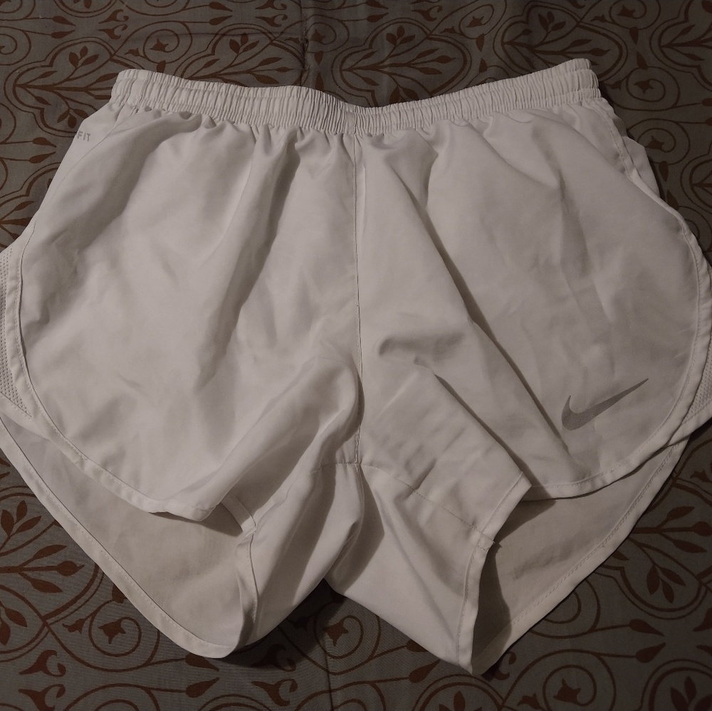 White Nike shorts